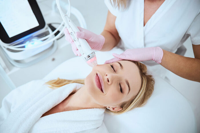 Patient undergoing advanced cosmetic facial therapy